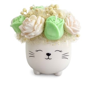 Bouquet de velas en taza decorativa